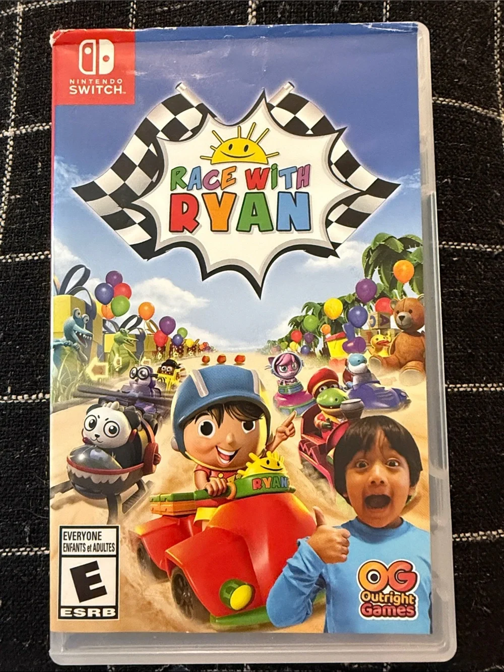 Nintendo Switch — Blue & Multicolor Race With Ryan Cover
